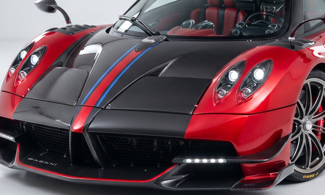 Exposed carbon bonnet with red and blue stripes
