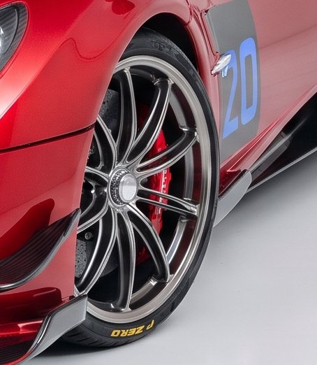 Front wheel and red brake caliper